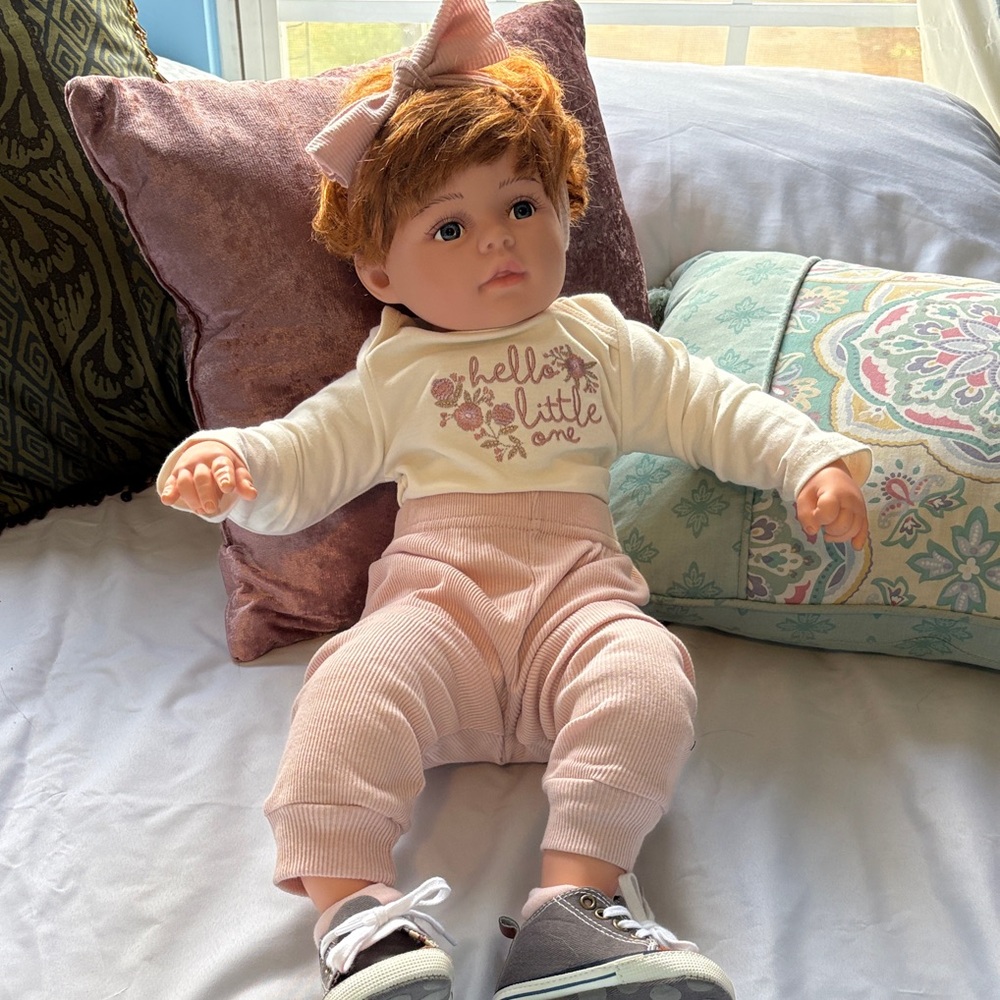 Realistic Baby Doll with Red Hair and Blue Eyes